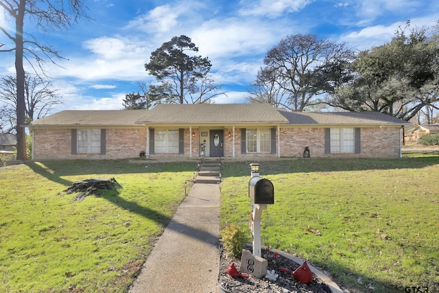 ranch-style house with a front yard