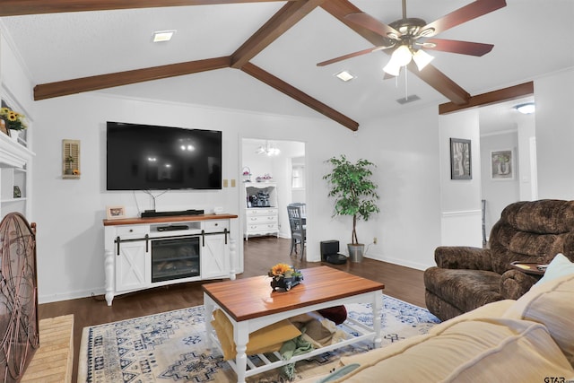 living room with ceiling fan with notable chandelier, a brick fireplace, lofted ceiling with beams, and dark hardwood / wood-style flooring