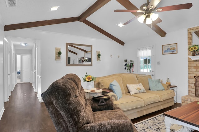 living room featuring a fireplace, lofted ceiling with beams, ceiling fan, and dark wood-type flooring