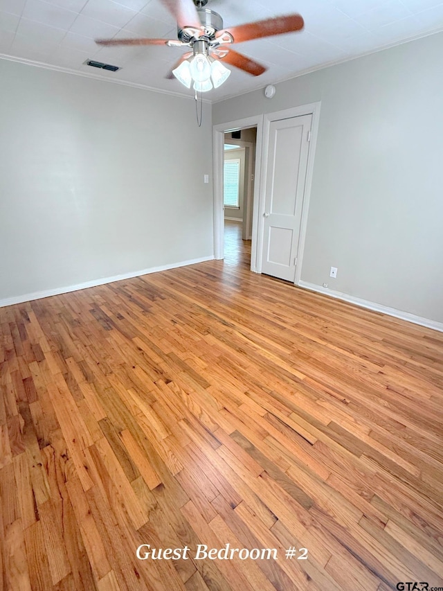 902 W 9th St, Tyler, TX 75701 - unfurnished room featuring light wood-type flooring, a ceiling fan, baseboards, and ornamental molding