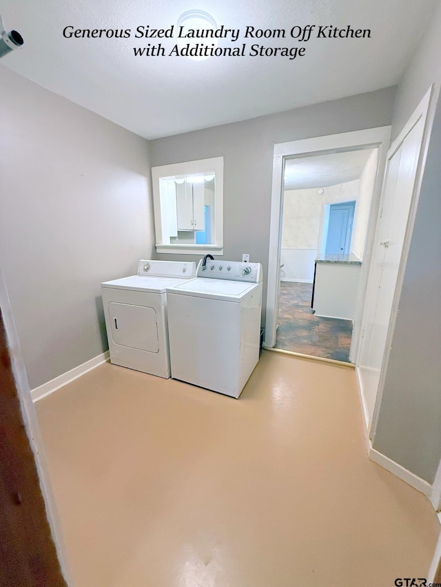 902 W 9th St, Tyler, TX 75701 - laundry room with washing machine and clothes dryer and baseboards