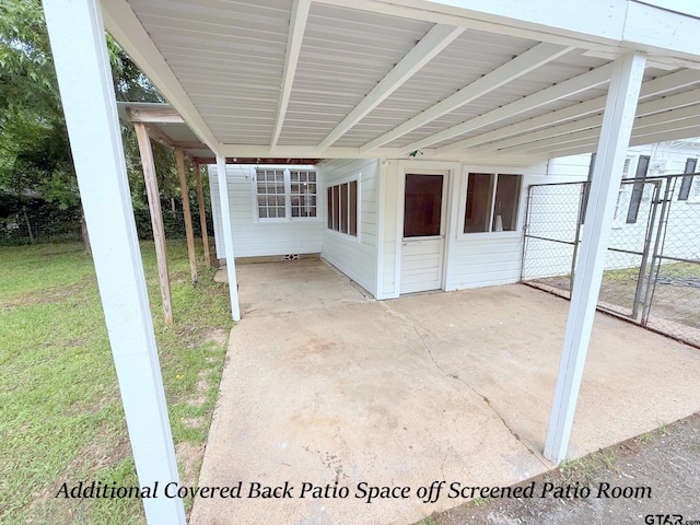 902 W 9th St, Tyler, TX 75701 - view of patio featuring a carport