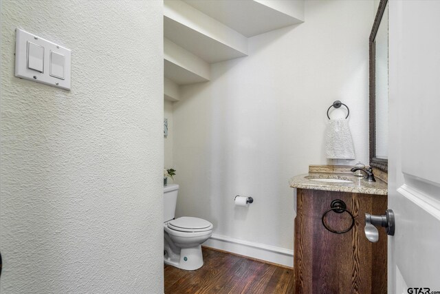 1299 Shadow Lks, Terrell, TX 75160 - bathroom featuring vanity and wood finished floors