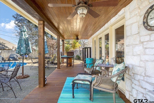 wooden terrace with ceiling fan