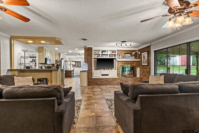 306 Dellwood Dr, Mount Pleasant, TX 75455 - living area with ceiling fan, ornamental molding, recessed lighting, and a textured ceiling