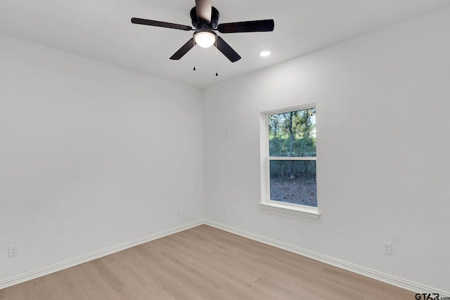 unfurnished room with light wood-style flooring, baseboards, ceiling fan, and recessed lighting