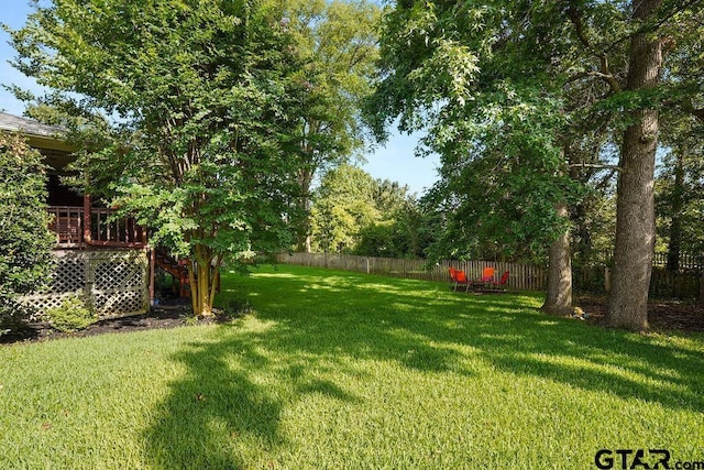 502 Northcreek Dr, Chandler, TX 75758 - view of yard with a wooden deck and stairway