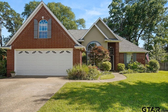 502 Northcreek Dr, Chandler, TX 75758 - traditional-style house featuring concrete driveway, brick siding, a front yard, and a shingled roof