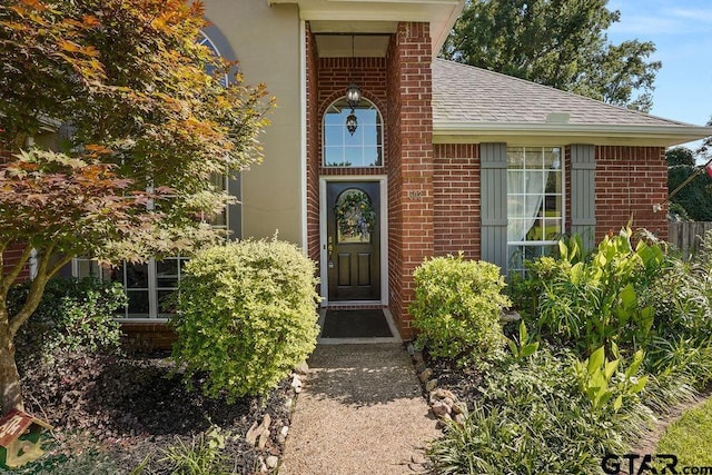 502 Northcreek Dr, Chandler, TX 75758 - entrance to property featuring roof with shingles and brick siding