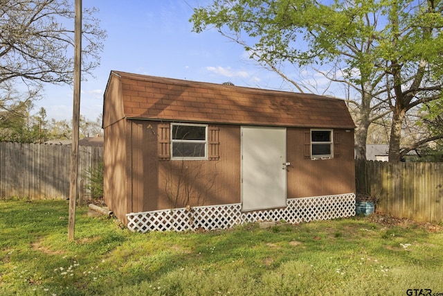 view of outdoor structure with a yard