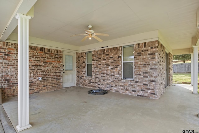 view of patio featuring ceiling fan