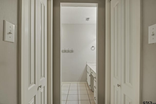 bathroom with vanity and tile patterned floors