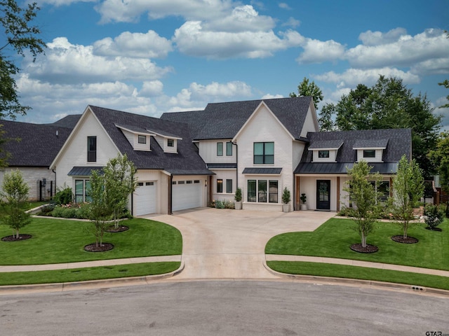 1555 Maple Crk, Tyler, TX 75703 - modern farmhouse style home with a standing seam roof, concrete driveway, and roof with shingles