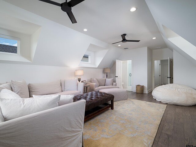 1555 Maple Crk, Tyler, TX 75703 - living room featuring ceiling fan, lofted ceiling, wood finished floors, and recessed lighting