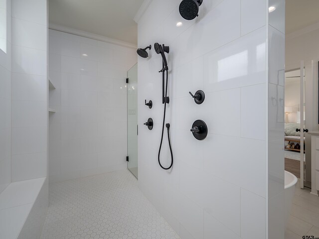 1555 Maple Crk, Tyler, TX 75703 - bathroom featuring walk in shower, crown molding, connected bathroom, and tile patterned flooring