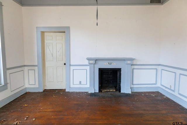 unfurnished living room with dark hardwood / wood-style flooring