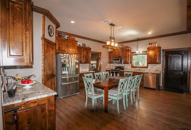 5000 Fm 315 S, Chandler, TX 75758 - dining room featuring dark wood-style flooring, crown molding, and recessed lighting