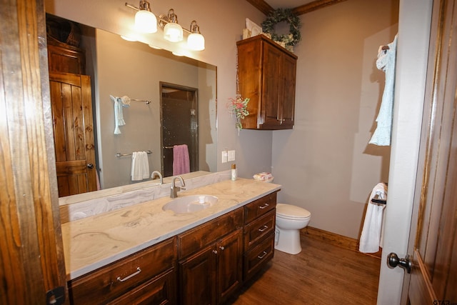 5000 Fm 315 S, Chandler, TX 75758 - full bathroom with wood finished floors, vanity, and toilet