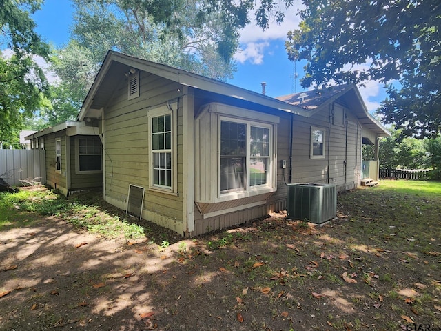 view of home's exterior with central AC unit