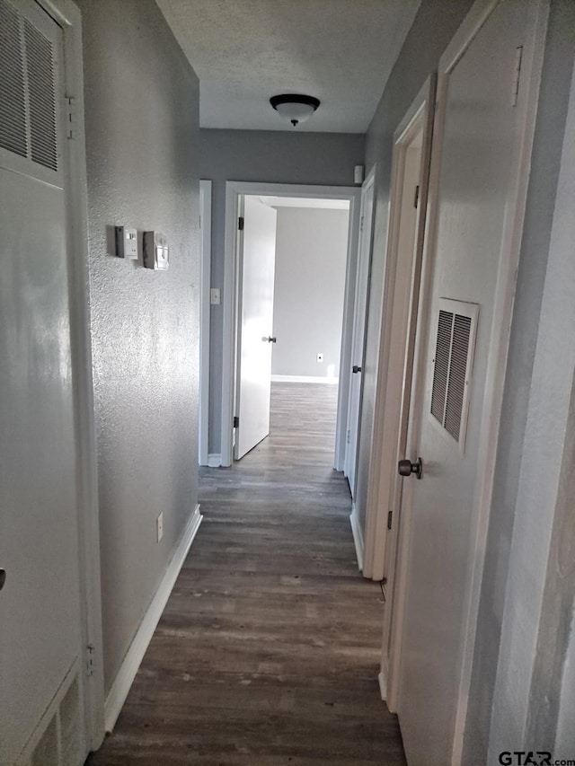 3107 Hamilton Ln, Texarkana, TX 75501 - hall with baseboards, wood finished floors, and a heating unit