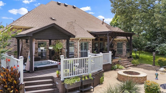 11187 Hunters Trl, Flint, TX 75762 - wooden terrace featuring an outdoor fire pit and a patio area
