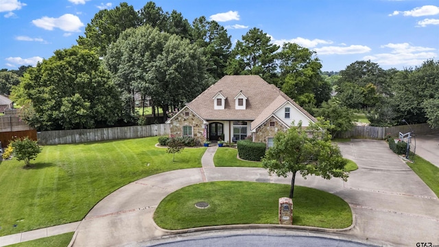 11187 Hunters Trl, Flint, TX 75762 - view of front facade with stone siding and curved driveway