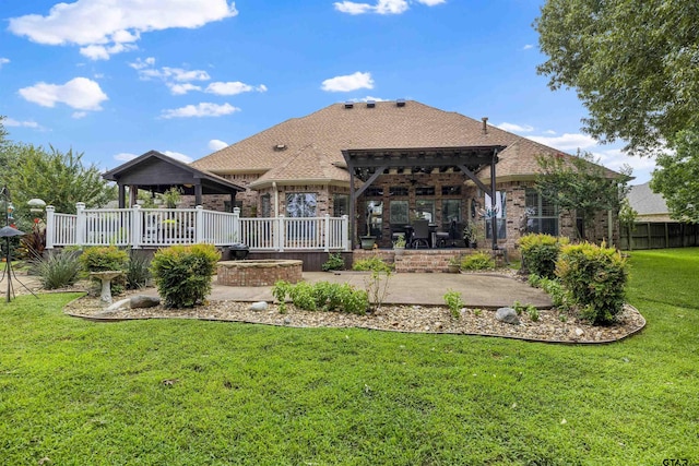 11187 Hunters Trl, Flint, TX 75762 - back of property featuring a pergola, a patio, brick siding, and a shingled roof