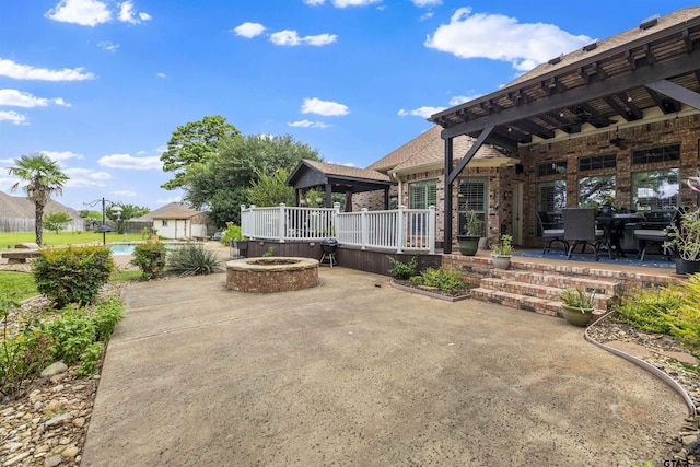 11187 Hunters Trl, Flint, TX 75762 - view of patio / terrace with a fire pit and a gazebo