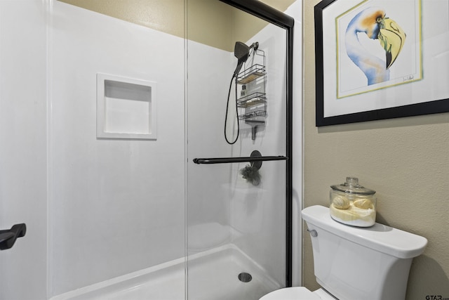 11187 Hunters Trl, Flint, TX 75762 - bathroom with a shower stall and a textured wall