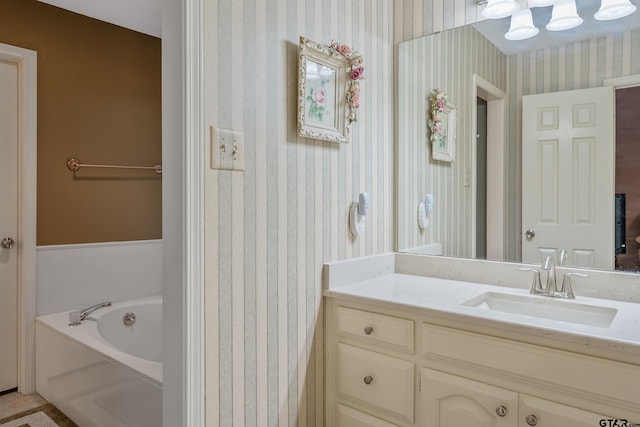 bathroom with a bathing tub and vanity