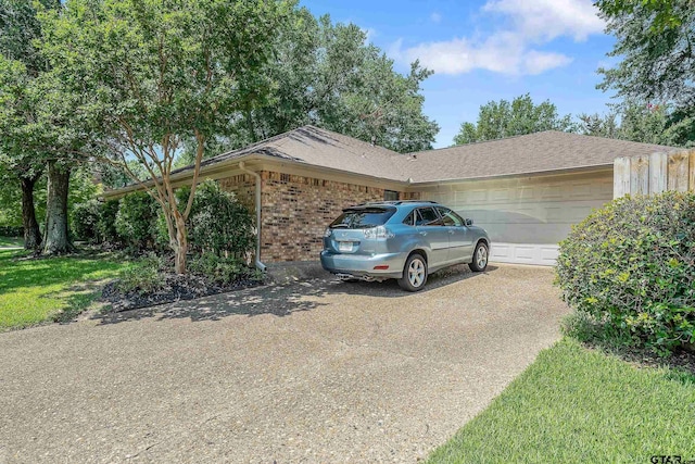 view of property exterior with a garage