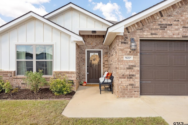 property entrance with a garage