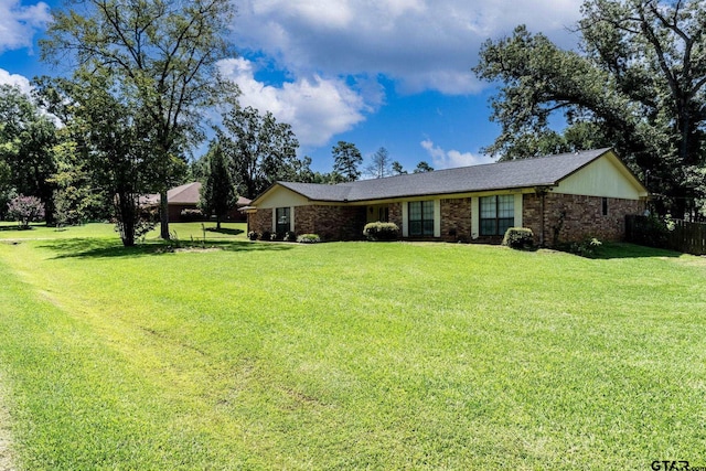 310 Windridge Rd, Palestine, TX 75801 - single story home featuring a front lawn