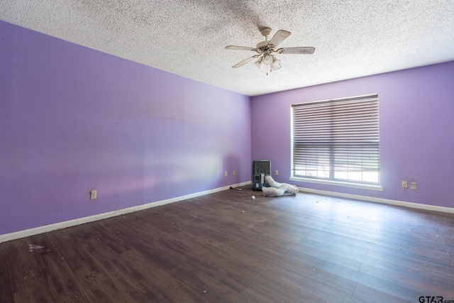 310 Windridge Rd, Palestine, TX 75801 - unfurnished room featuring a ceiling fan, a textured ceiling, and wood finished floors
