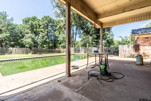 310 Windridge Rd, Palestine, TX 75801 - fenced backyard with a patio