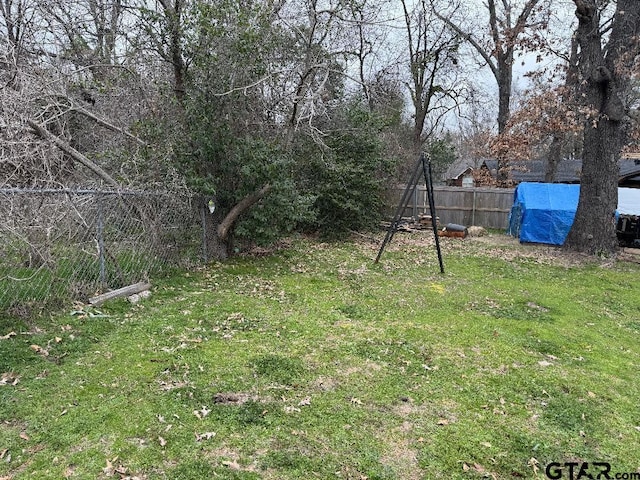 view of yard with fence