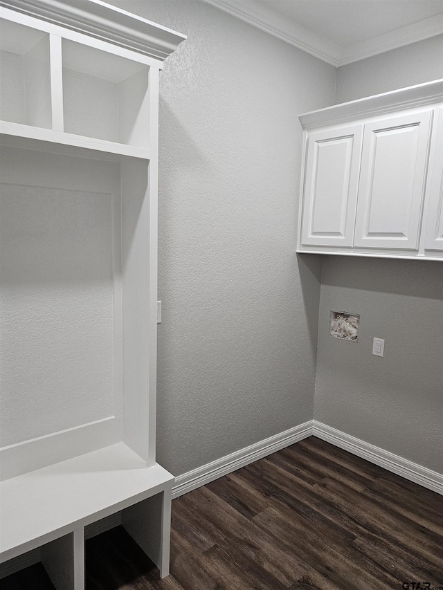 105 Johnston St, Arp, TX 75750 - mudroom with ornamental molding, baseboards, and dark wood-type flooring