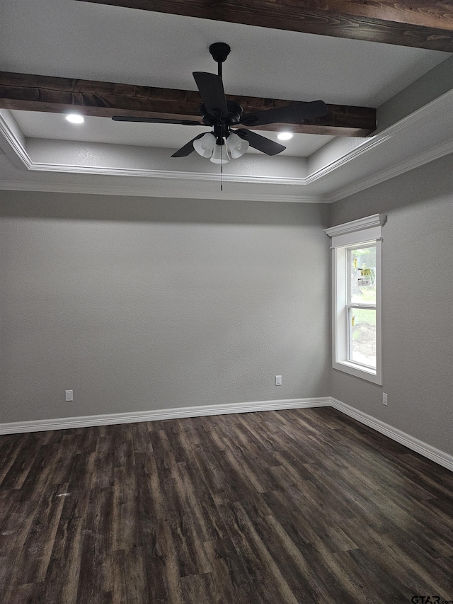 105 Johnston St, Arp, TX 75750 - empty room featuring beam ceiling, dark wood finished floors, baseboards, and a ceiling fan