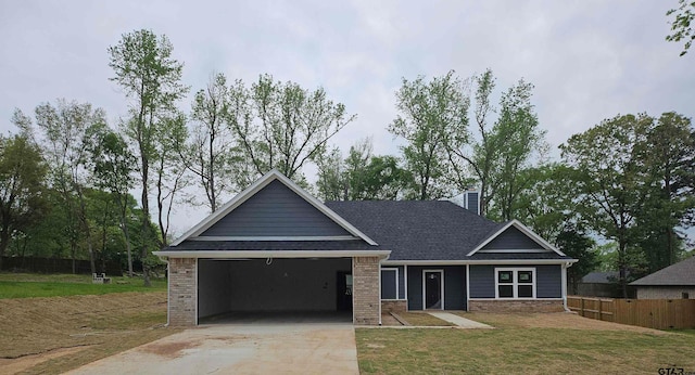 105 Johnston St, Arp, TX 75750 - view of front of house featuring a garage, driveway, and a chimney