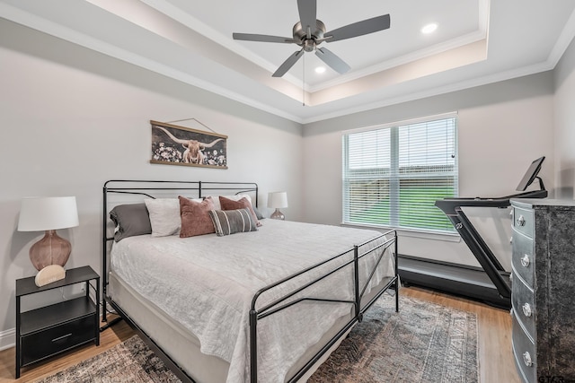 137 Sides Blvd, Bullard, TX 75757 - bedroom featuring a tray ceiling, wood finished floors, ornamental molding, recessed lighting, and ceiling fan