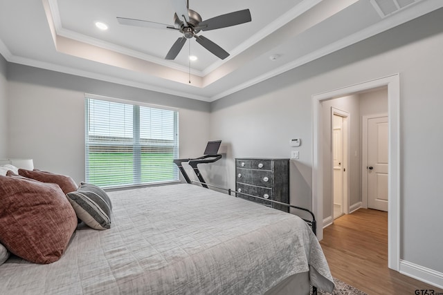 137 Sides Blvd, Bullard, TX 75757 - bedroom with ornamental molding, a raised ceiling, wood finished floors, baseboards, and a ceiling fan