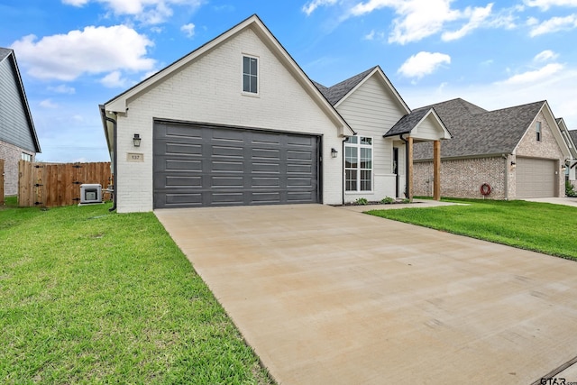 137 Sides Blvd, Bullard, TX 75757 - traditional-style house featuring brick siding, a garage, and driveway