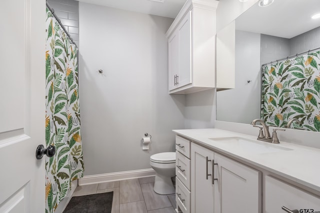 137 Sides Blvd, Bullard, TX 75757 - bathroom with toilet, vanity, tile patterned floors, baseboards, and curtained shower