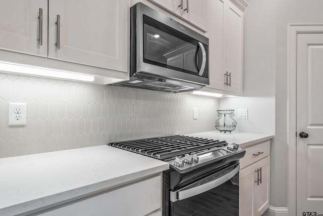 137 Sides Blvd, Bullard, TX 75757 - kitchen with stainless steel appliances, decorative backsplash, white cabinetry, and light stone counters