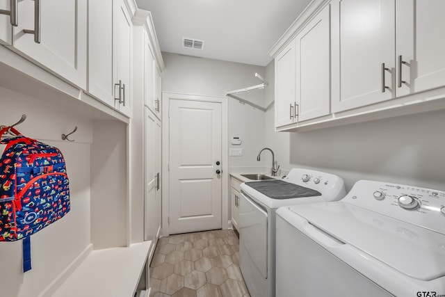 137 Sides Blvd, Bullard, TX 75757 - laundry area with independent washer and dryer, light tile patterned flooring, and cabinet space