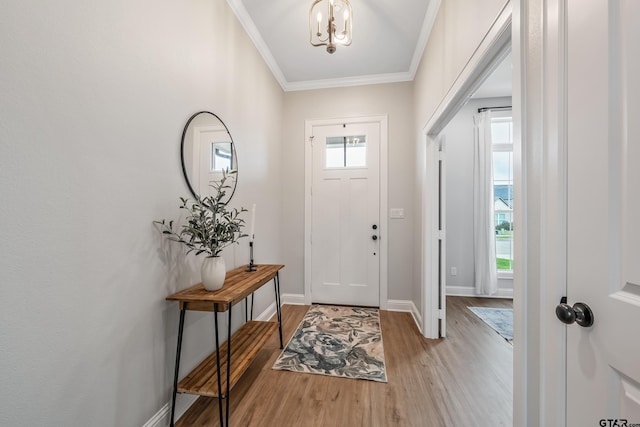 137 Sides Blvd, Bullard, TX 75757 - entrance foyer featuring light wood-type flooring, crown molding, baseboards, and a chandelier