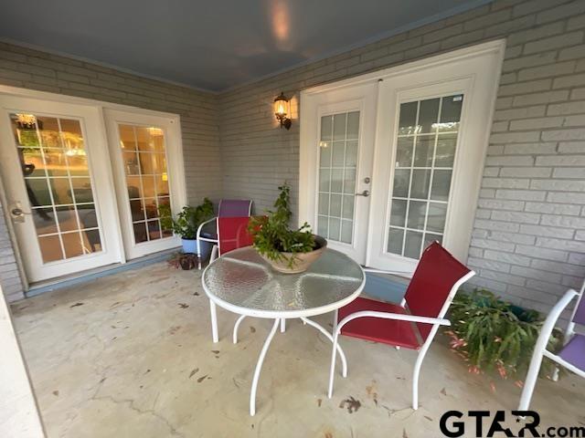 view of patio featuring french doors