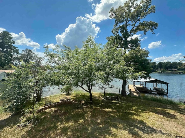 dock area featuring a water view