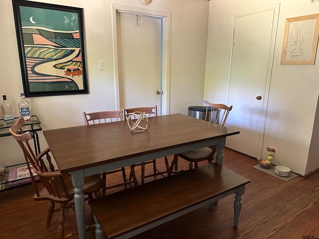 dining room featuring dark hardwood / wood-style flooring