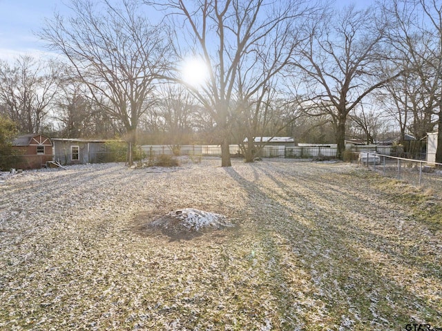 view of front of home featuring fence